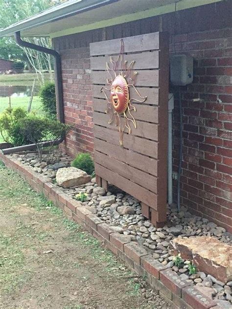 ways to hide outside electrical box|hiding utility boxes around house.